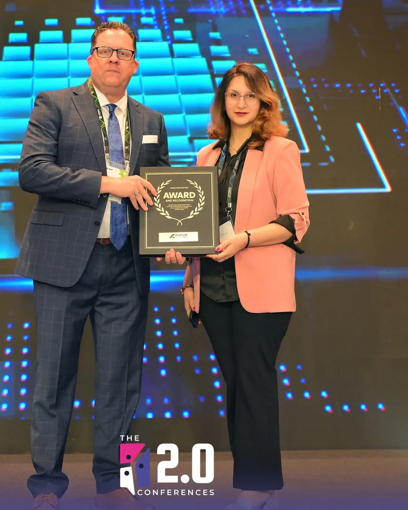 Anjali Dutta receiving an award in Dubai