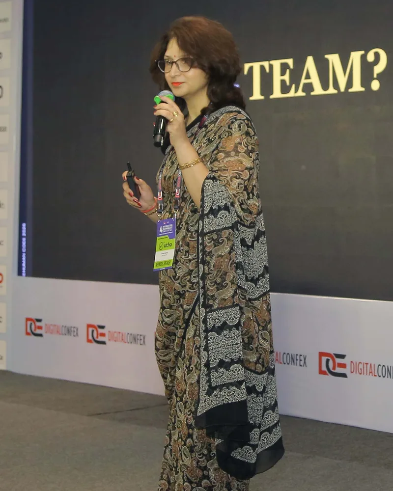 Anjali Dutta speaking at a conference